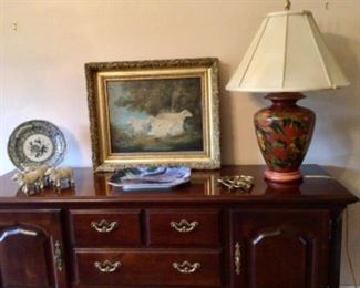 Sideboard, painted floral lamp, transferware Spode plate, old sheep oil painting, iron sheep figures