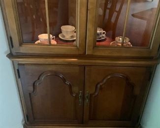 (52) $300 - Cherry Corner Cabinet by Harden.  40w 18d  78h.   Matches table and chairs #51