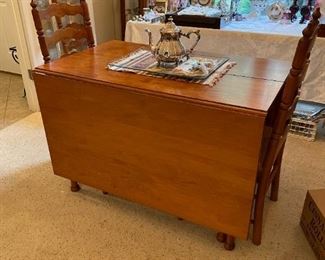 Table with leaf - offered for $250.00 early sale.