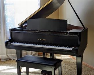 Kawai Black Satin Baby Grand Piano. Model GM-12 was purchased new in 2006. The sellers are accomplished piano players and the piano is frequently serviced/tuned by Laursen Piano Co. The cabinet, strings and keys all look to be in excellent condition. The winning bidder is responsible for providing or hiring assistance to disassemble and move this item. Please note that the piano movers book out fast and pre planning would be a great idea!