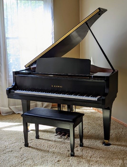 Kawai Black Satin Baby Grand Piano. Model GM-12 was purchased new in 2006. The sellers are accomplished piano players and the piano is frequently serviced/tuned by Laursen Piano Co. The cabinet, strings and keys all look to be in excellent condition. The winning bidder is responsible for providing or hiring assistance to disassemble and move this item. Please note that the piano movers book out fast and pre planning would be a great idea!