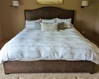 Gorgeous Eddie Bauer Home Brown Leather King Size Bed Frame. There are some light scratches on the leather, but in otherwise excellent condition.