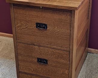 Stickley Mission File Cabinet. There are some light scratches/ marks on the top that can be seen in the photos. Measures 22” wide, 28” deep and 29” high.