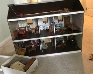 Vintage handmade dollhouse with lots of dollhouse furniture