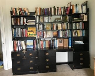 Desk and shelving set. Lots and lots of books.