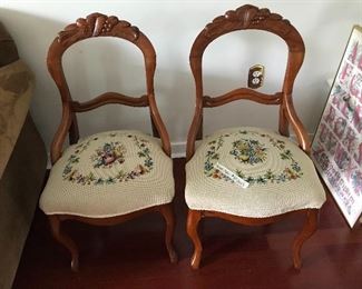Carved chair with embroidered seats