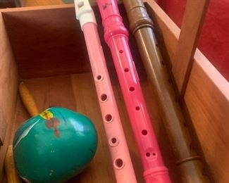 colorful recorders and maraca