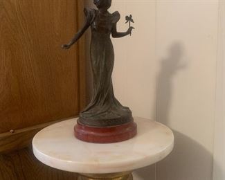bronze fairy figurine on marble-top table pedestal