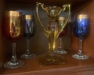 gold-rimmed iridescent goblets