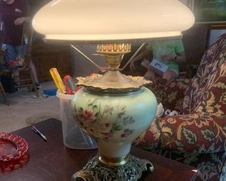 white hand painted hurricane lamp with brass base