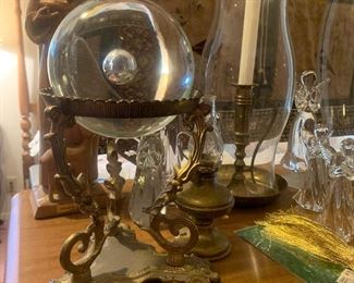 crystal ball in brass stand
