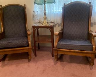matching pair of wood and upholstery rocking chairs