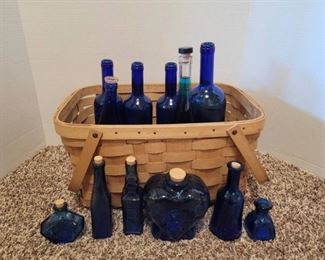 Cobalt Blue Glass Bottle Collection and Sturdy Picnic Basket