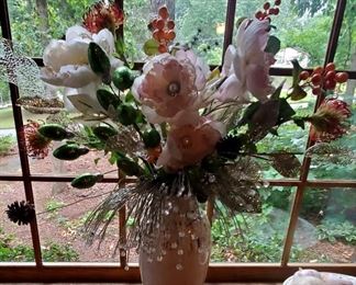 Light and lovely floral arrangment with pink silk peonies, green bulbs, beaded sprigs,  and various other floral