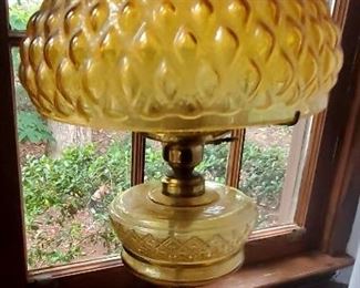A thousand eyes lamp by Adam's and Co. The lamp was previously an oil lamp and converted to an electric lamp.