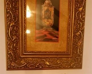 Ornate gold framed print.  Decorative plate and brass bell on floating shelf. Bell Sold.