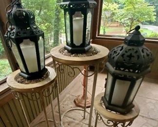 Metal and glass lanterns various sizes of wood and metal plant stands