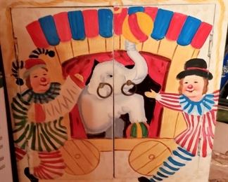 Circus themed small cabinet.