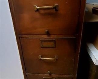 Very old file cabinet. Plywood sides 
