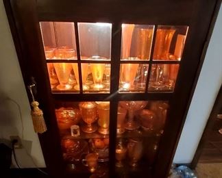 Black walnut Lighted China cabinet.  It is no longer legal.at this time to harvest and build with Black walnut trees and their wood.  This piece is special and increasingly rare.