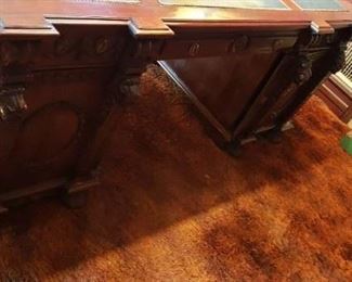Gorgeous Carved Partners Desk with Leather top inserts. Measures: 79"W x 41"D x 31"H Has some damage on one of the doors and another area. Asking $4995 obo Have matching Credenza Ex condition Measures 80"W x 18.5"D x 35.5"H Asking $4995 obo Both pieces $9500 obo