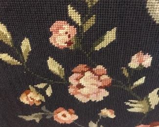 Up close detail of hand stitching of the fire screen 