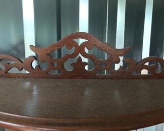 Detail in curio shelf