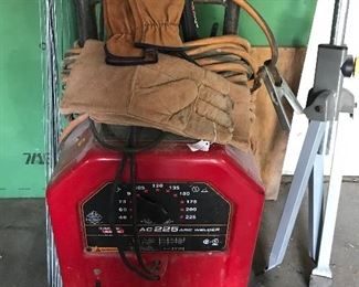 Lincoln Electric AC 225 Arc Welder and rolling stand, 
Welding gloves, 