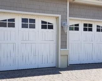 Garage doors are 9 ft. wide x 8 ft. tall