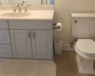 Pretty blue bath vanity - multiple units available. Kohler commode