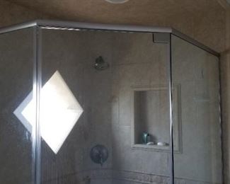 Glass shower enclosure