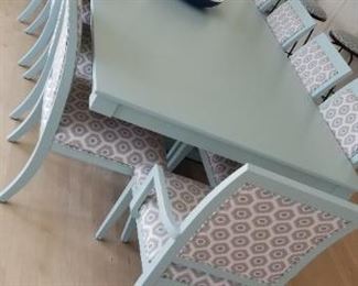 Elegant light teal dining table seats 10