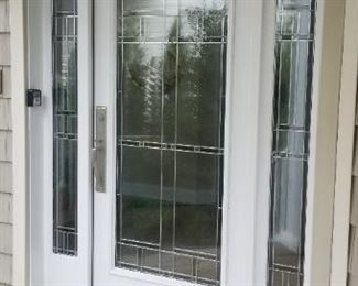 Gorgeous entry door with two side lights