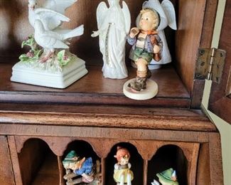 Beautiful desk filled with collectibles