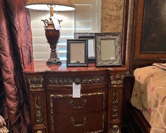 Beautiful master bedroom furniture.  Pair of these side tables.