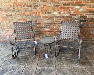Pair of metal rocking chairs and table