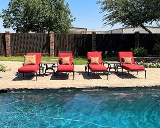 4 Frontgate loungers.  2 heavy stone side tables.  