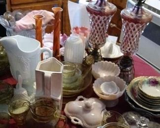 Some uranium glass, Milk glass grape design pitcher , hysee punch bowl set and pair lovely cranberry glass lamps in mint condition.  I  may have more uranium glass in one of the storage area bins and to be able to check soon.  