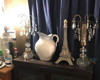 Pair of stunning lead crystal and tear drop tube style lamps, with hanging crystals . Mint condition.                    Very cool Eiffel tower Liquor decanter    very pretty mint condition old fashioned pitcher, very big size. 