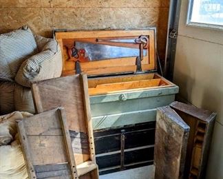 In the corner are 2! Handmade carpenter chests from way back... The top one includes the 2 Disston handsaws as well! The bottom one doesn't have any tools in the tool holders, but it does have a semi-secret lower drawer!