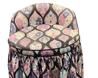 Plush, swivel, vanity stool upholstered in Pucci fabric