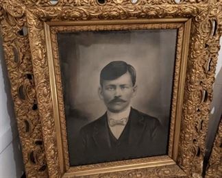 Very large vintage man and woman photographs nicely framed