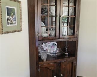 Dark dining room corner hutch, matching table and chairs 
