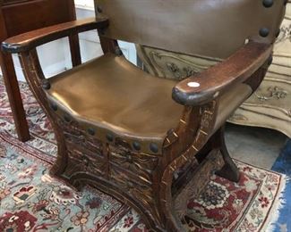 carved leather chair