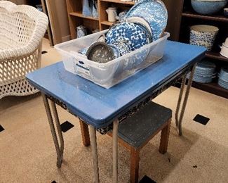 Antique table - with pull out sides.  We have two of the benches you see under the table.