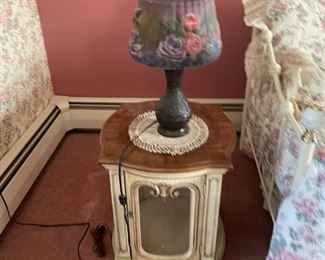 . . . a cute night stand and nice lamp