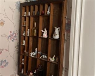 . . . an old printer's drawer shadow box with minis