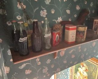 . . . vintage Coke bottles, tobacco tins, baby powder tin