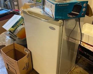 . . . a dorm fridge and soup pots