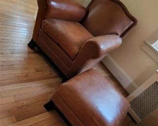 Real leather chair with matching footrest, by Hickory Chair